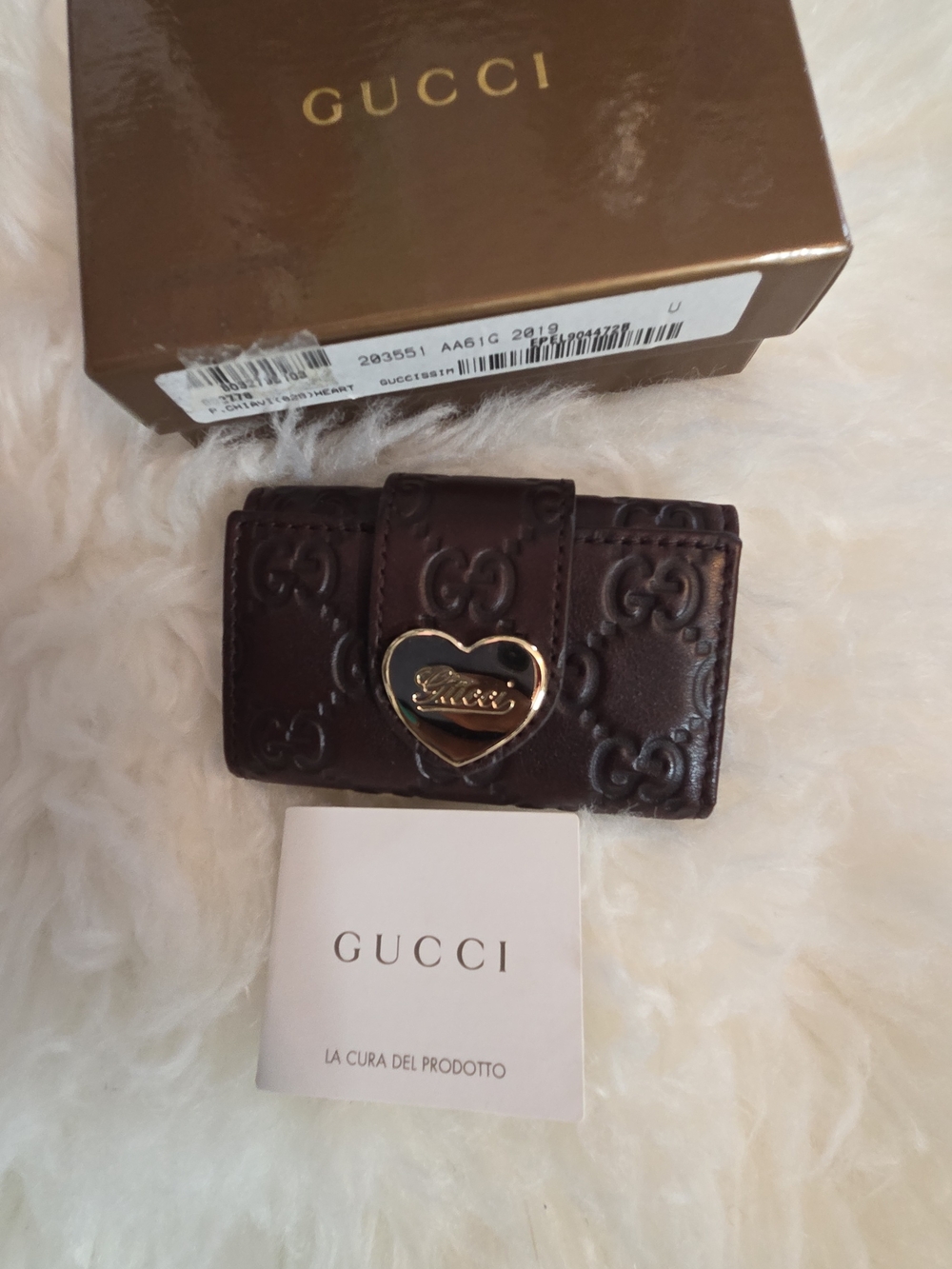 Gucci Brown Embossed GG Leather Trifold Card Case